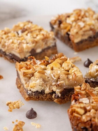 Seven layer bar squares on parchment paper