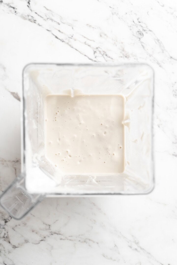 Overhead view of cashew sour cream in blender