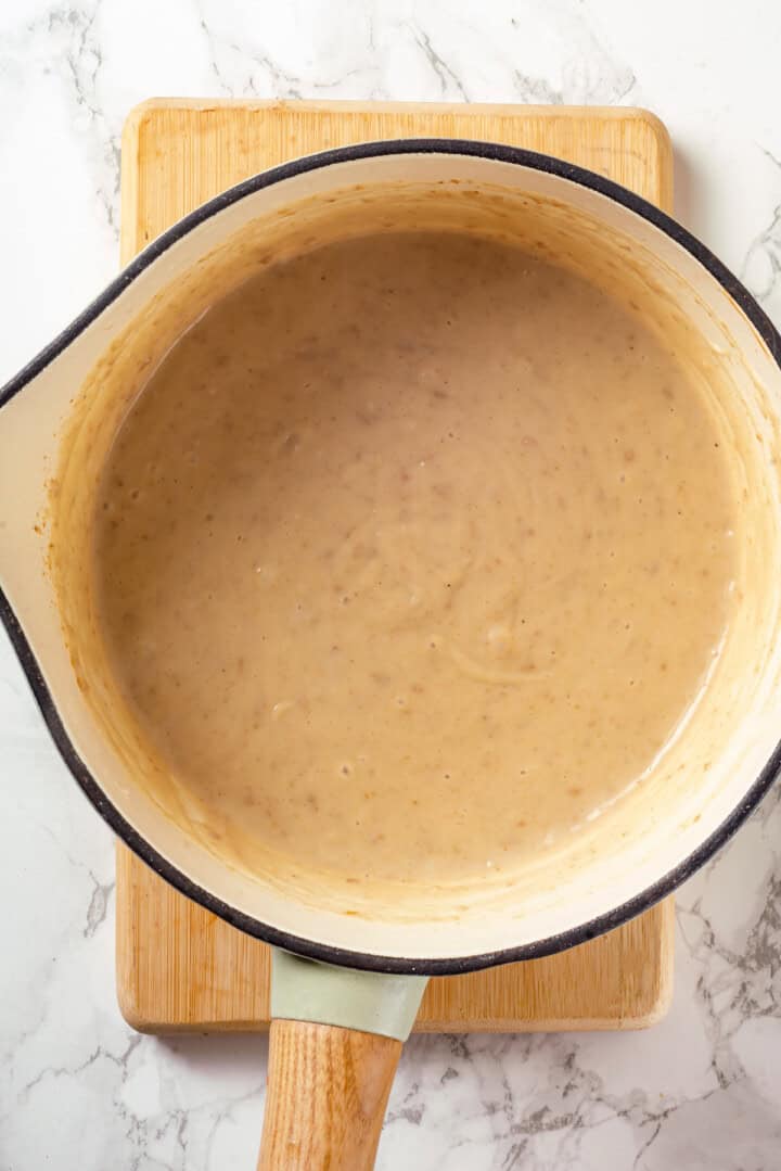 Overhead view of bechamel sauce in pan