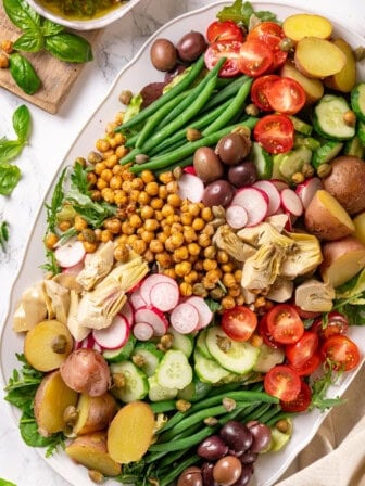 Overhead view of vegan nicoise salad on platter