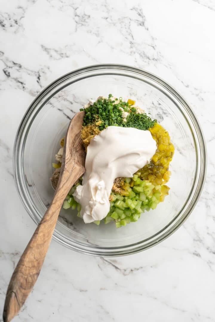 Ingredients for vegan egg salad in mixing bowl