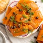 Overhead view of carrot lox on bagel