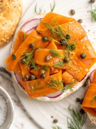 Overhead view of carrot lox on bagel