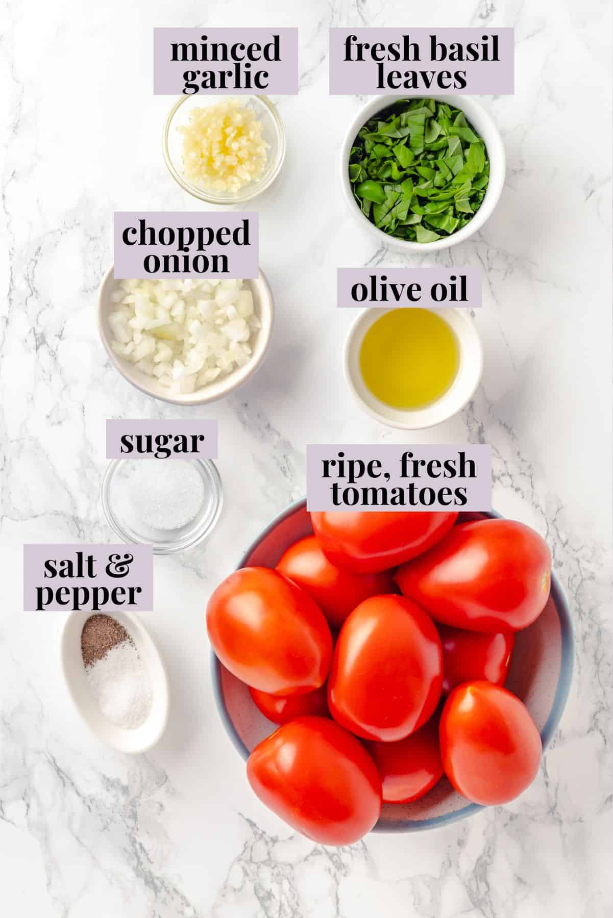 Overhead view of ingredients for pomodoro sauce with labels