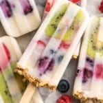 Pile of yogurt popsicles with fruit and granola