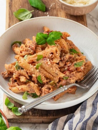 Creamy marry me pasta in bowl with fork