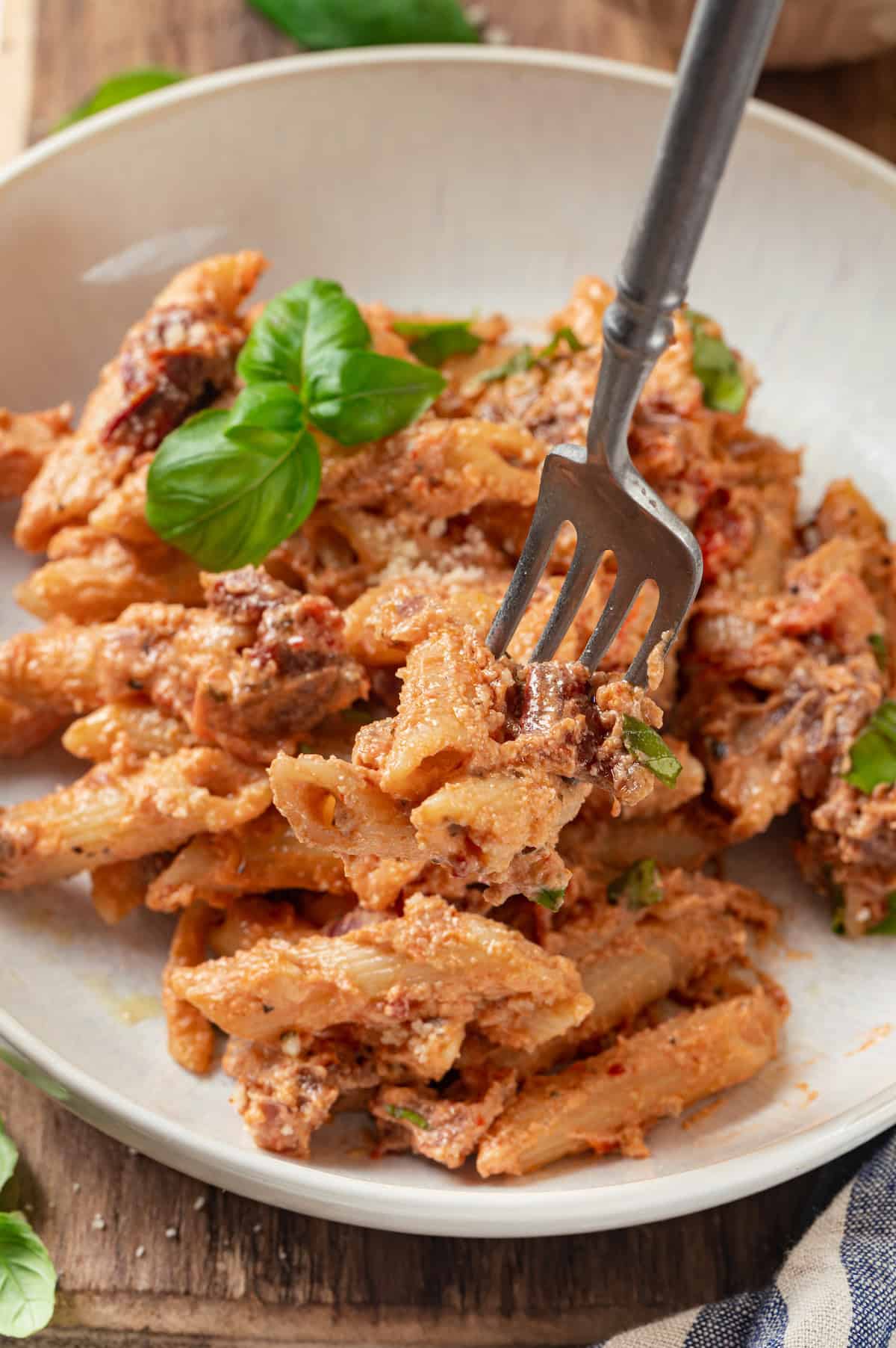 Forkful of marry me pasta in bowl