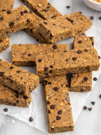 Pile of vegan protein bars on parchment paper