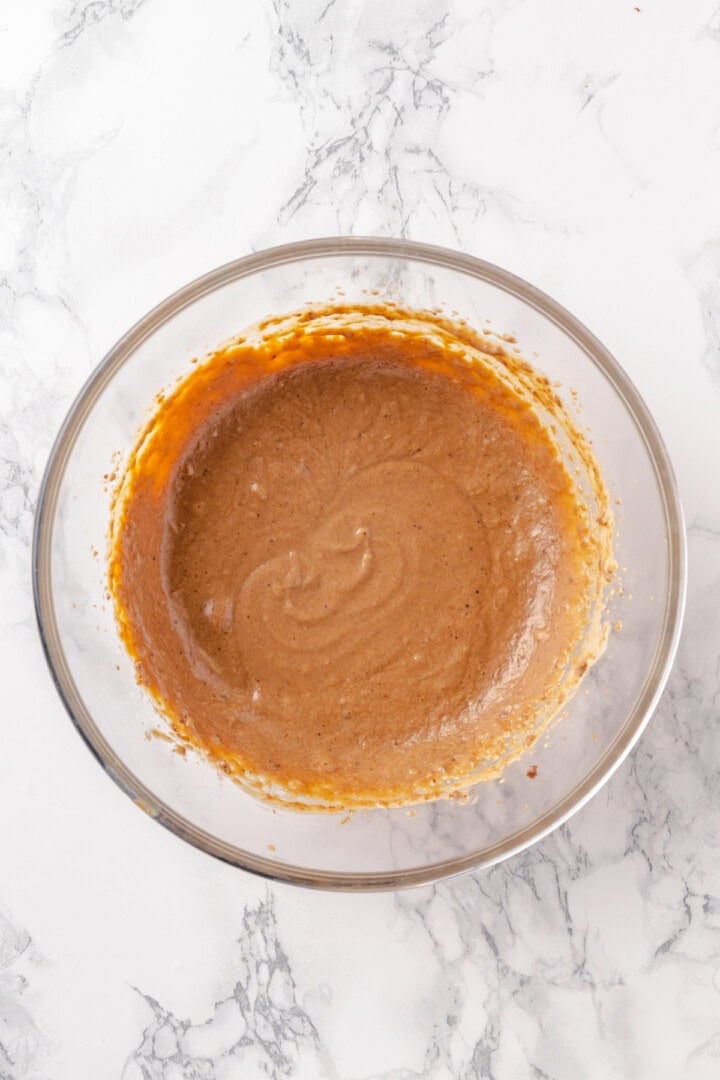 Overhead view of batter for hot buttered rum in mixing bowl