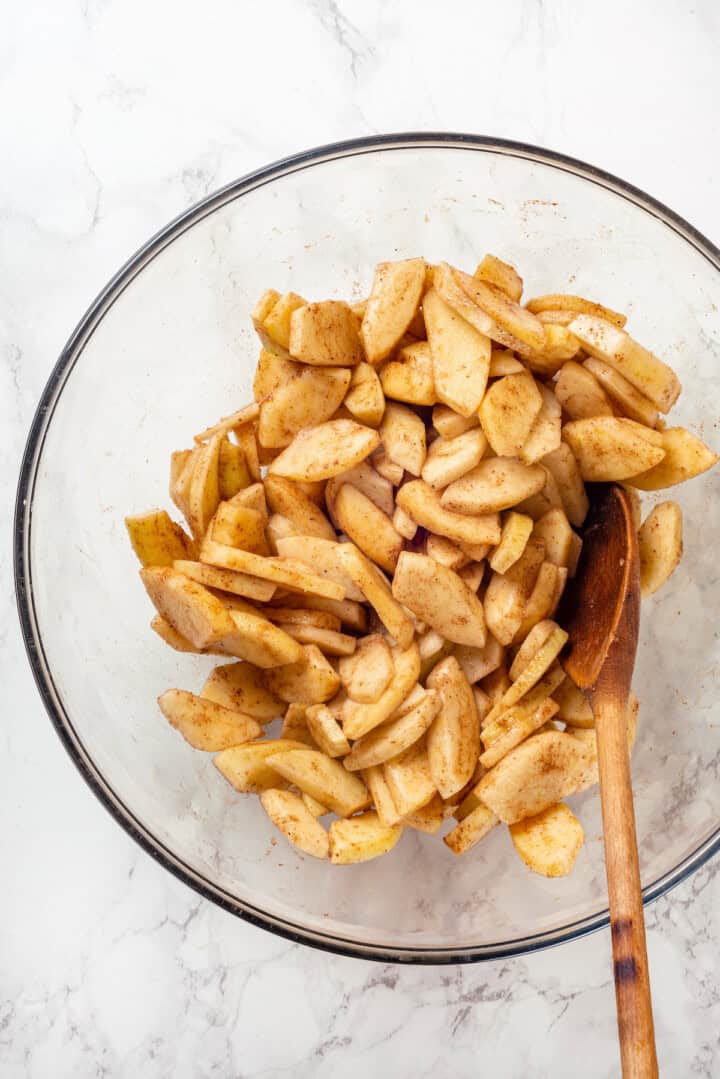 Overhead view of apple filling in mixing bowl