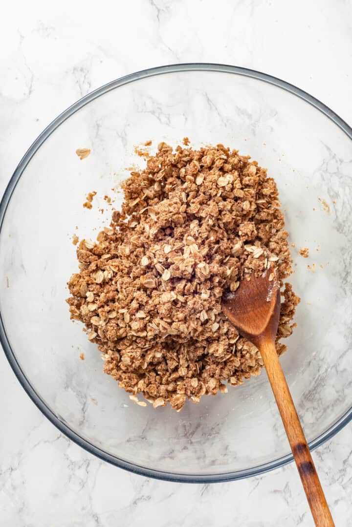 Overhead view of crisp topping in mixing bowl