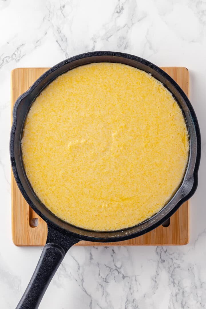 Corn pone batter in skillet