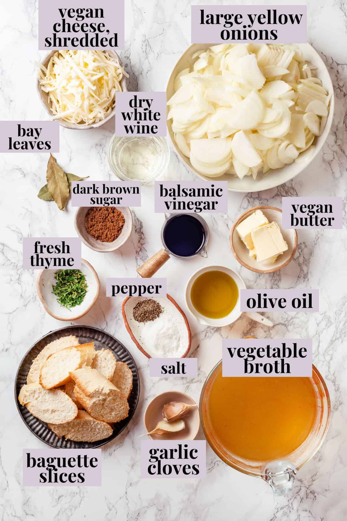 Overhead view of ingredients for French onion soup with labels