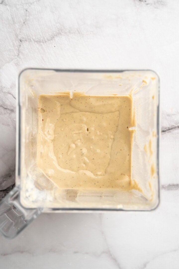 Overhead view of cashew cream in blender