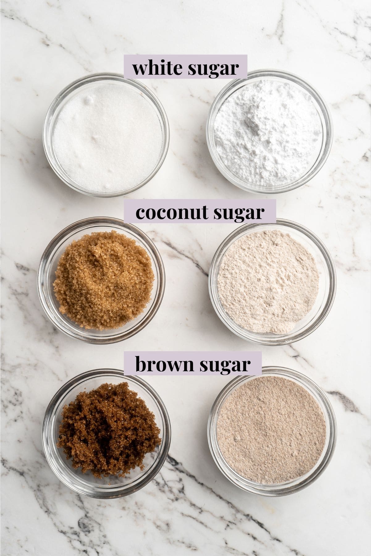 Overhead view of white sugar, brown sugar, and coconut sugar made into powdered sugar