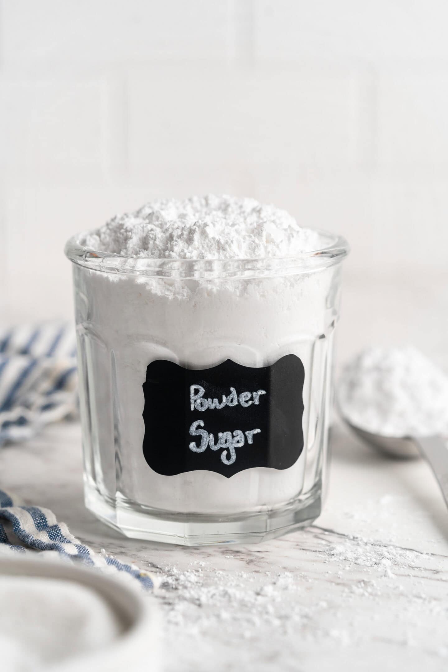 Powdered sugar in labeled jar