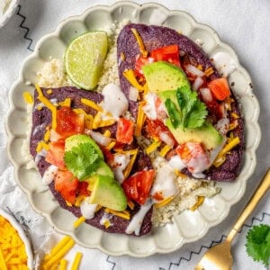 Two tlacoyos on a plate.