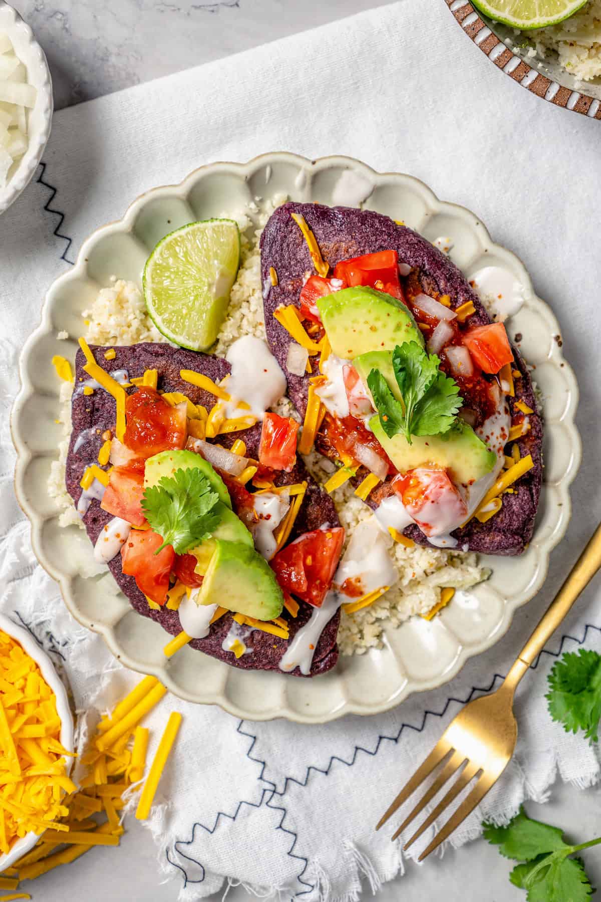 Two tlacoyos on a plate.