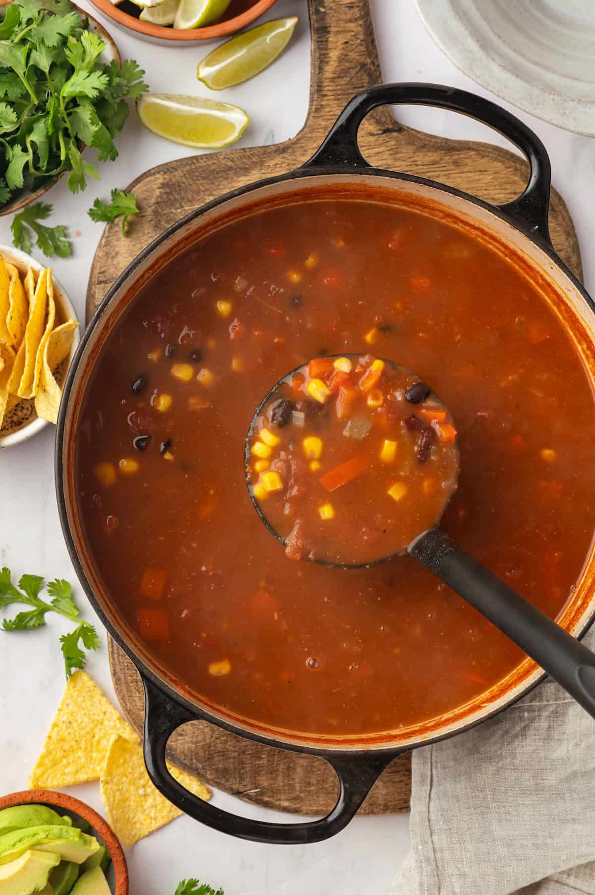 Ladle of taco soup in pot