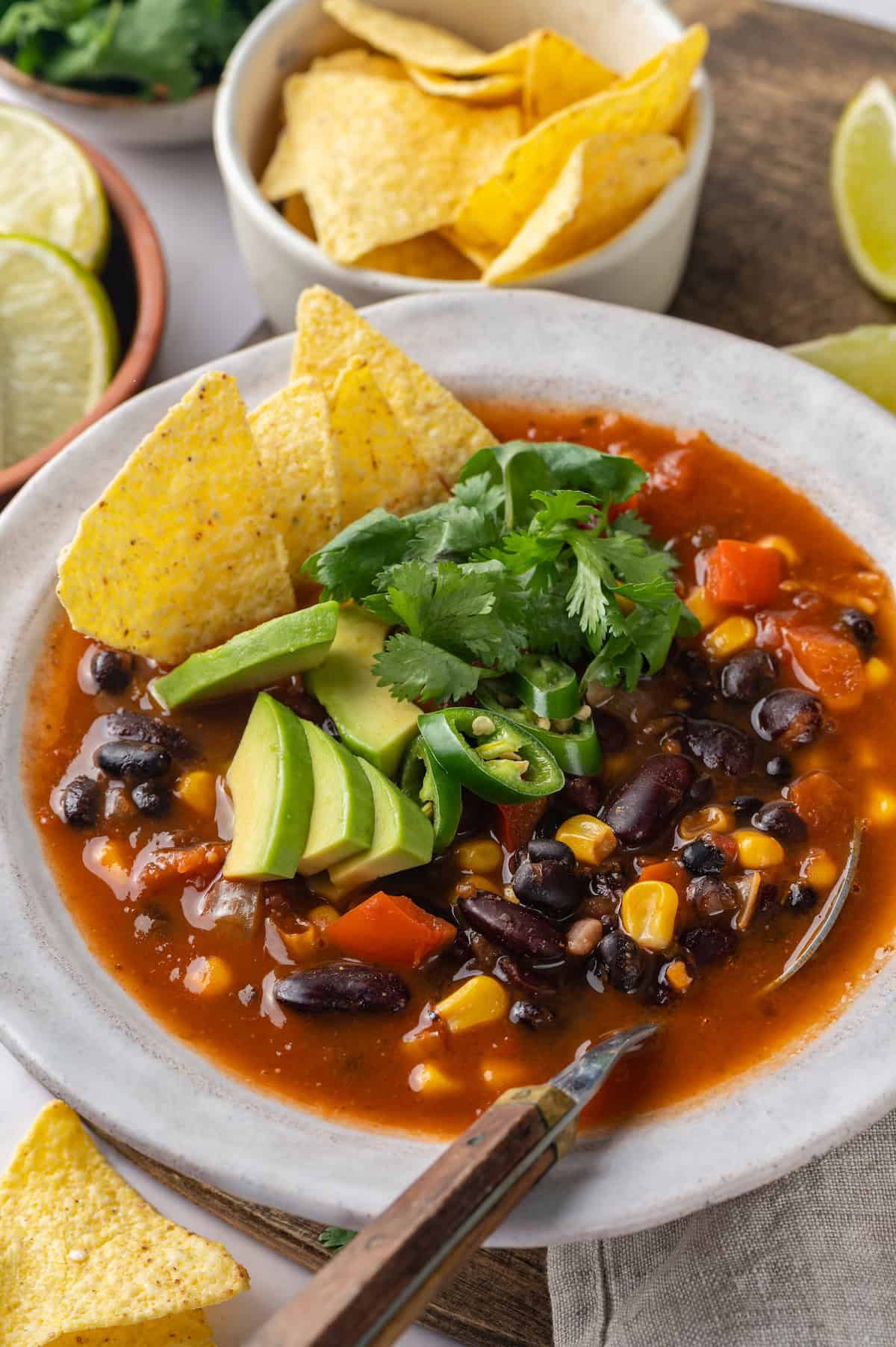 Bowl full of taco soup with spoon