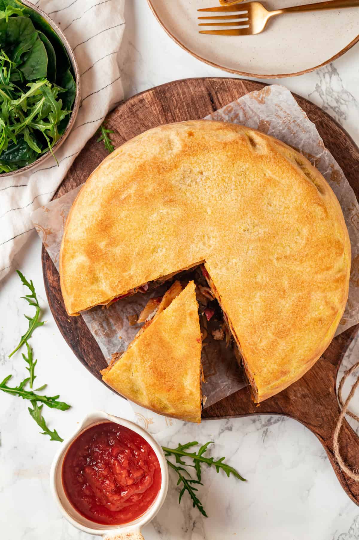 Overhead view of timpano with slice cut