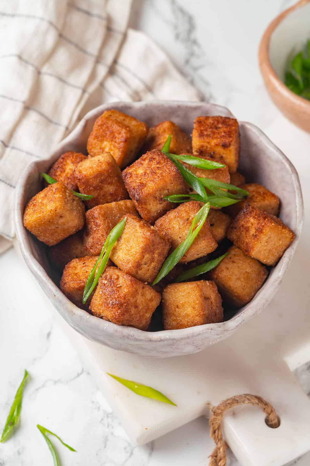 Bowl of crispy fried tofu