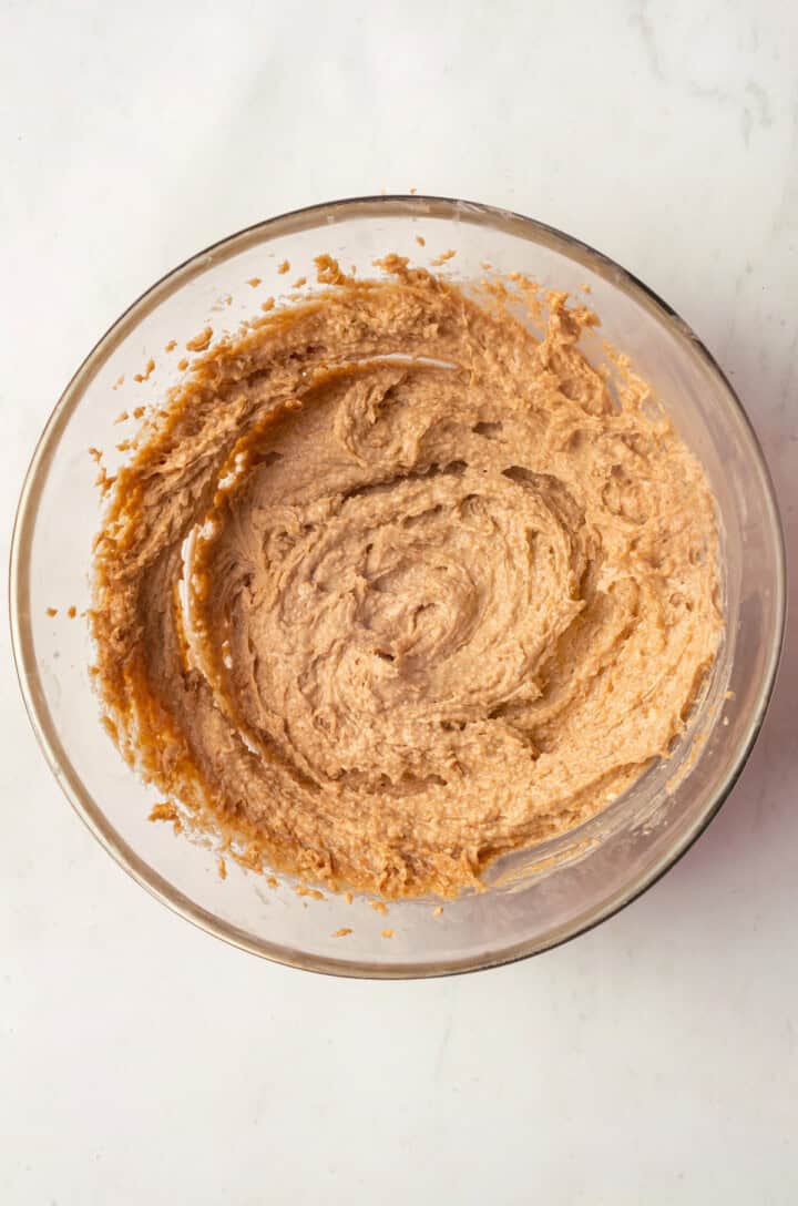 Creamed vegan butter and sugar in mixing bowl