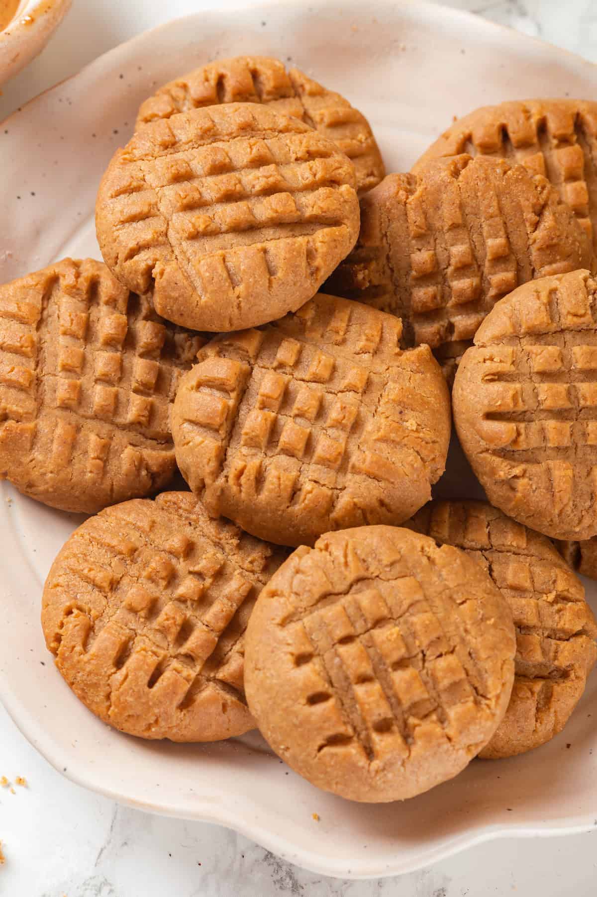 Overhead view of peanut butter cookies on plate