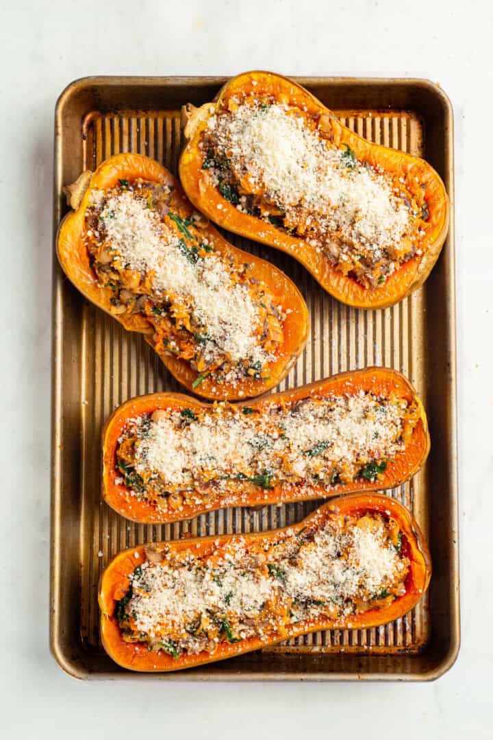 Stuffed butternut squash on pan