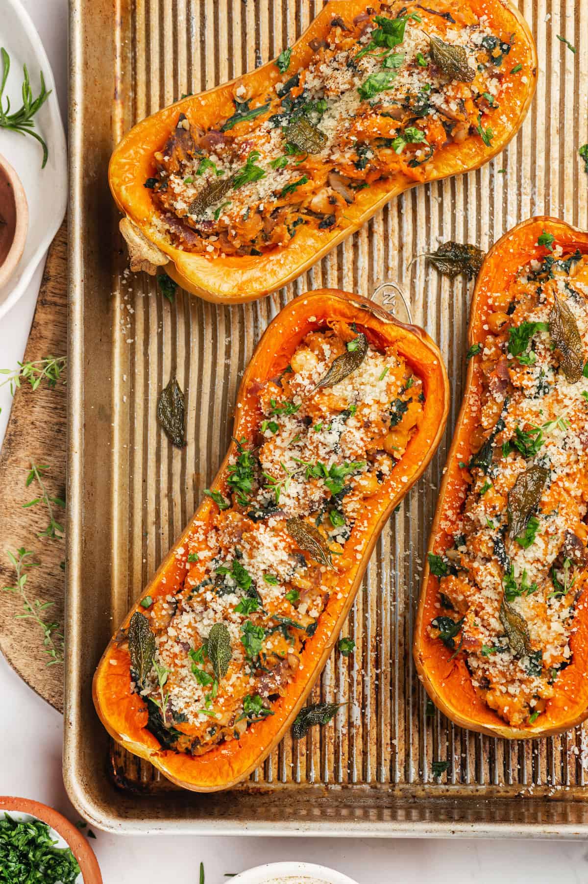 Vegan stuffed butternut squash on sheet pan