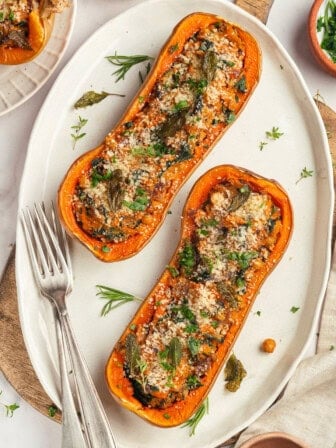 Overhead view of stuffed butternut squash on platter