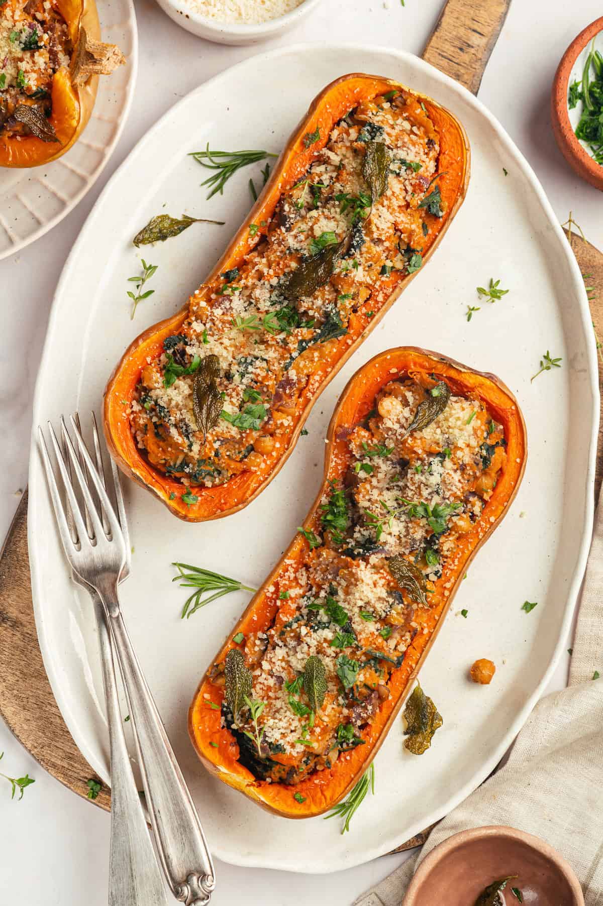 Overhead view of stuffed butternut squash on platter