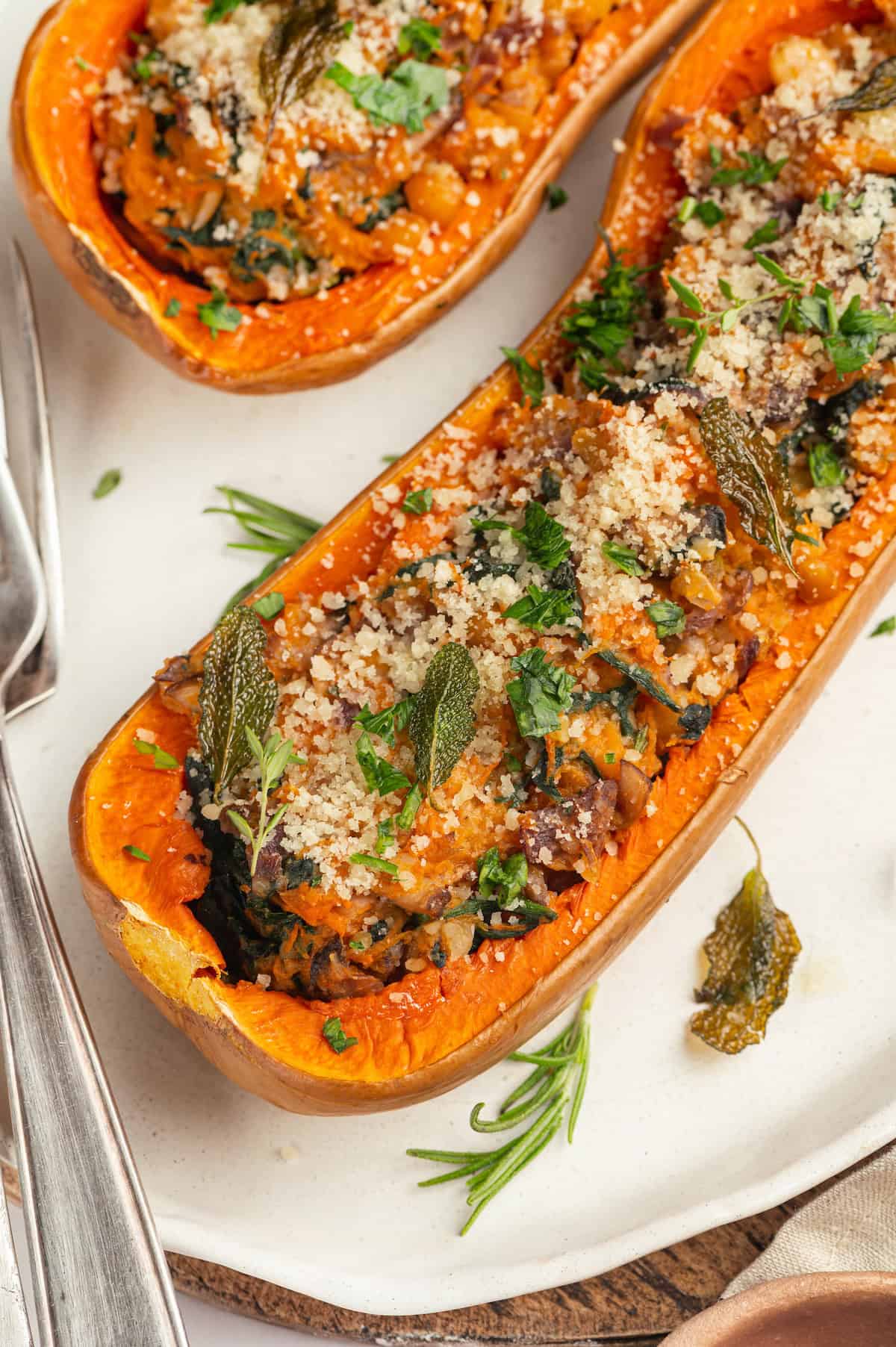 Vegan stuffed butternut squash on platter