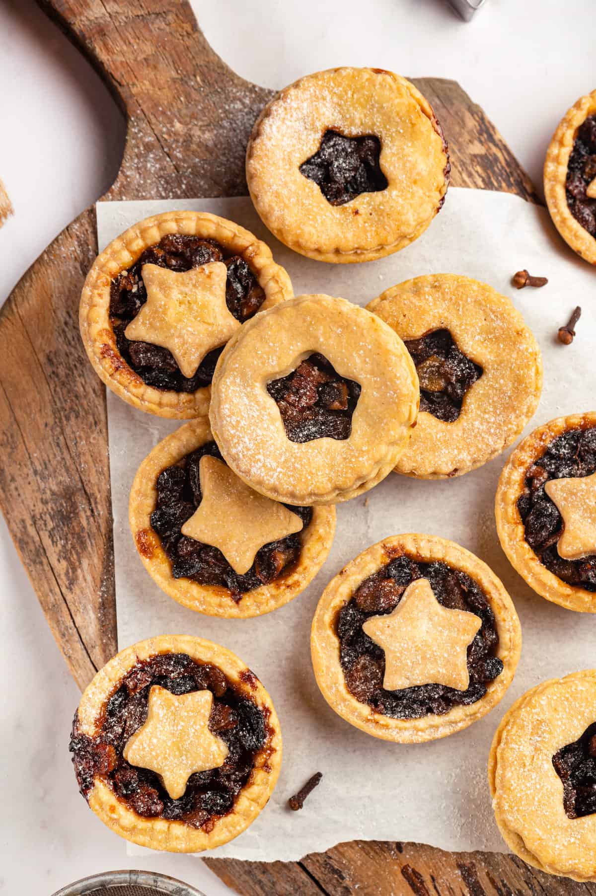 Overhead view of mince pies on board