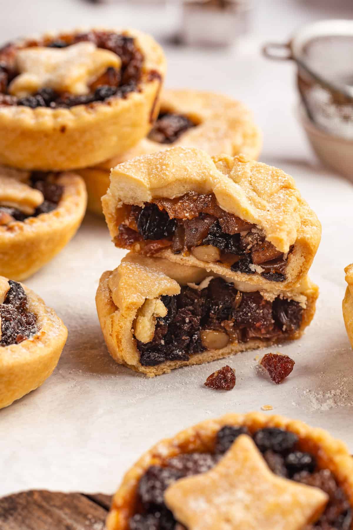 Two mince pie halves stacked on top of each other