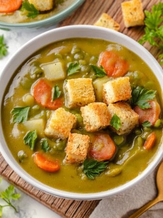 Vegan split pea soup in bowl with croutons