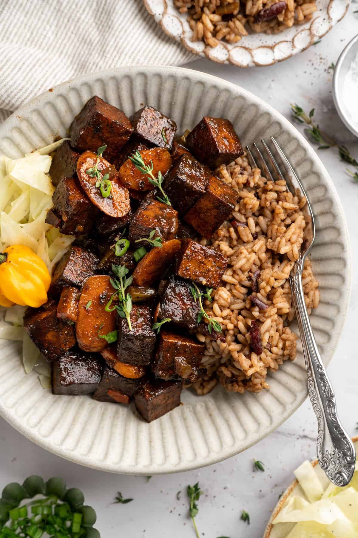 Bowl of brown stew tofu with rice