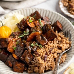 Brown stew tofu in bowl with rice