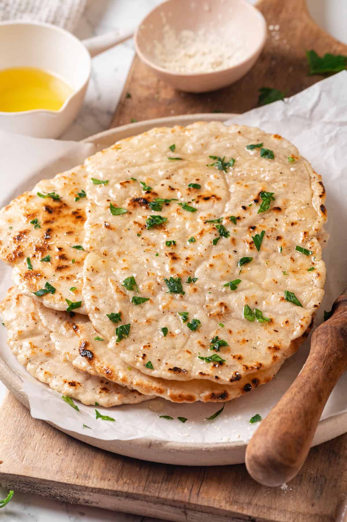 Stack of gluten-free naan on plate