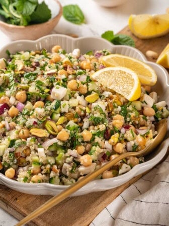 Vegan Jennifer Aniston salad in serving bowl with spoon