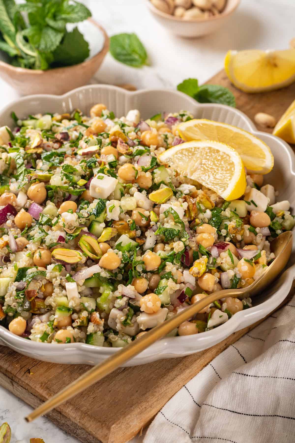 Vegan Jennifer Aniston salad in serving bowl with spoon