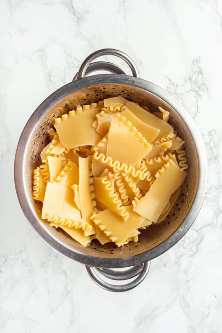 Lasagna noodles in colander