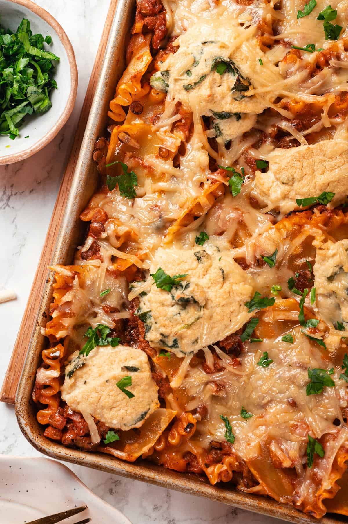 Overhead view of vegan sheet pan lasagna in pan