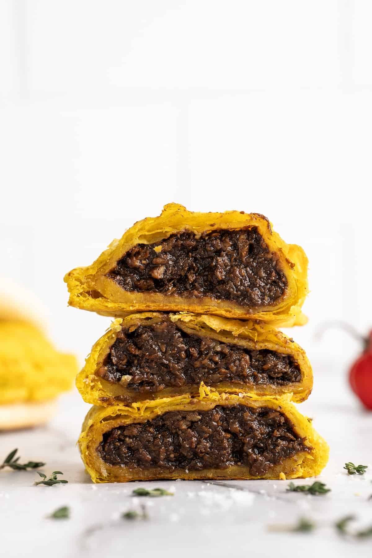 Stack of 3 halved vegan Jamaican patties