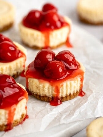 Mini vegan cheesecakes with cherry topping