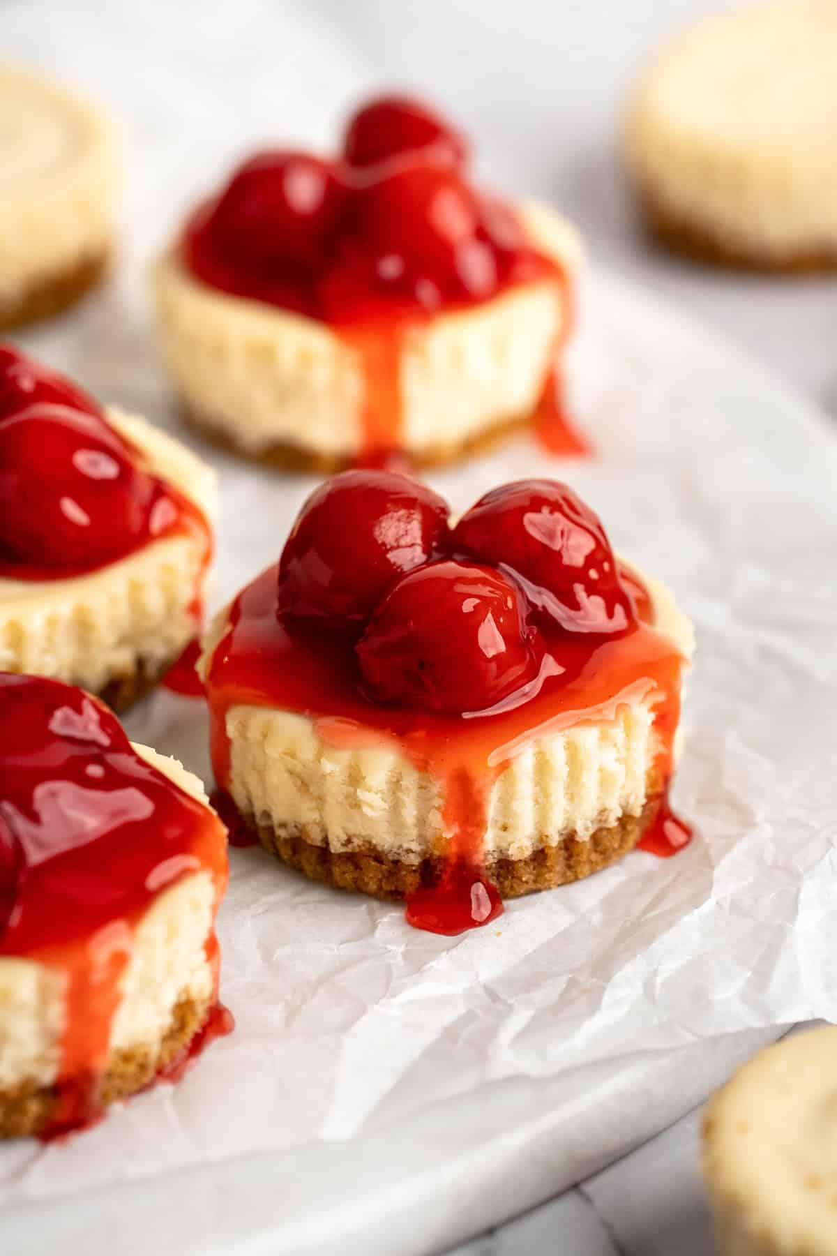 Mini vegan cheesecakes with cherry topping