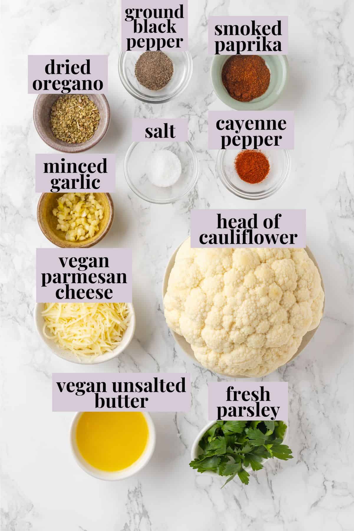 Overhead view of ingredients for whole roasted cauliflower with labels