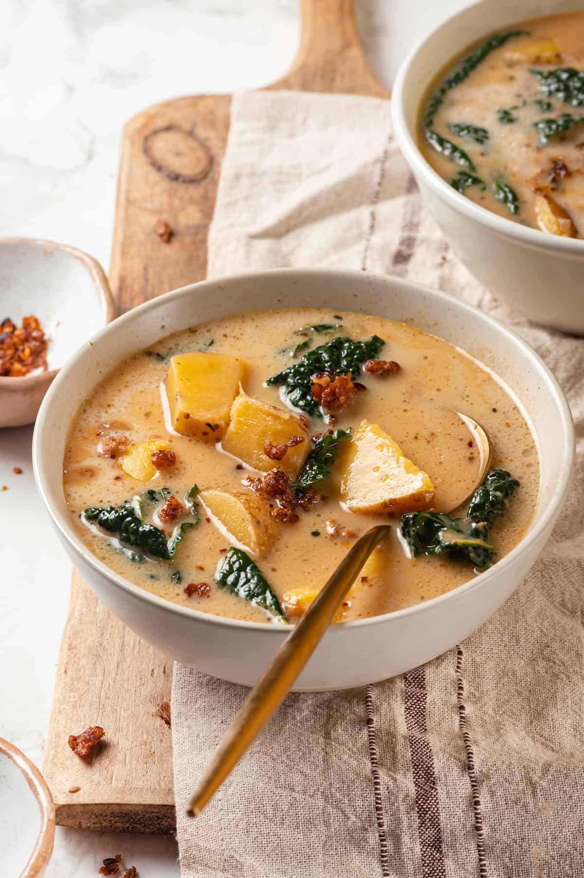 Creamy zuppa toscana in two bowls