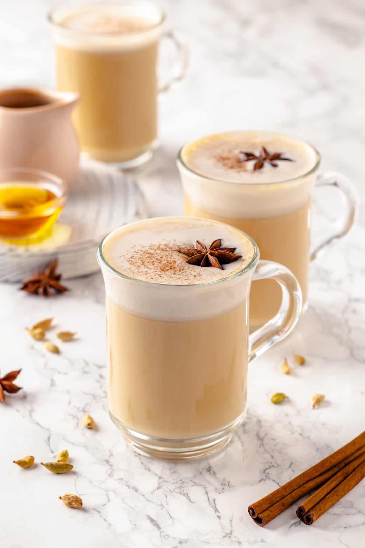 Homemade dirty chai lattes in 3 mugs