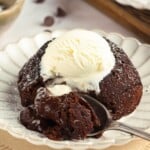 Spoon digging into vegan chocolate lava cake
